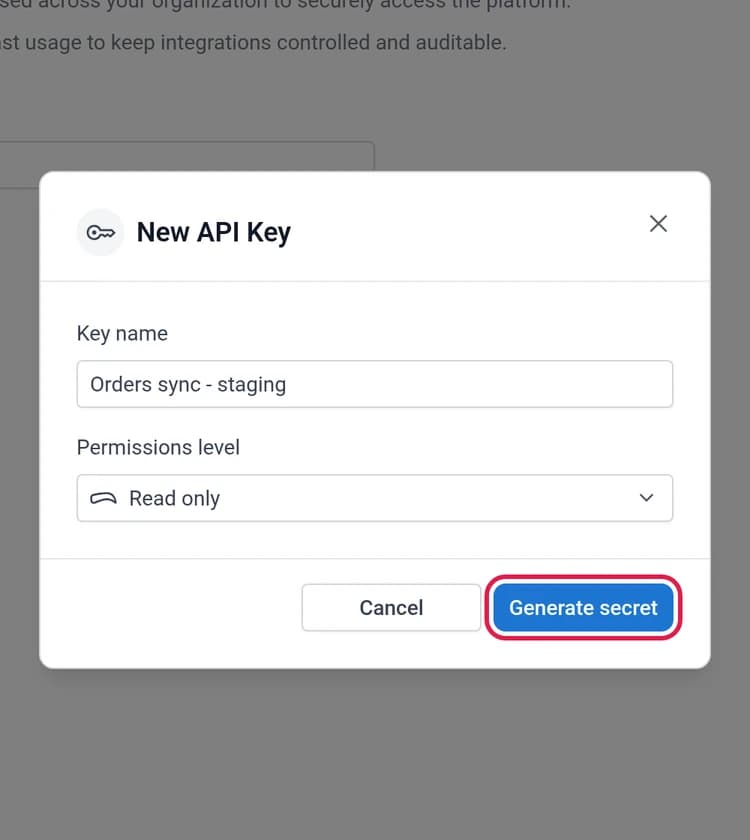 The filled-in New API Key dialog with the Generate secret button outlined