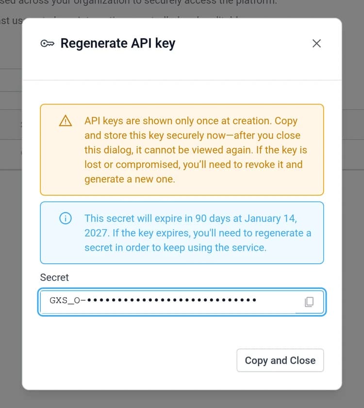 The Regenerate API key dialog showing the new, masked secret